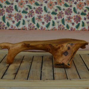 A live edge centerpiece or charcuterie serving board made from reclaimed Bay Area olive wood and finished with food-safe mineral oil.